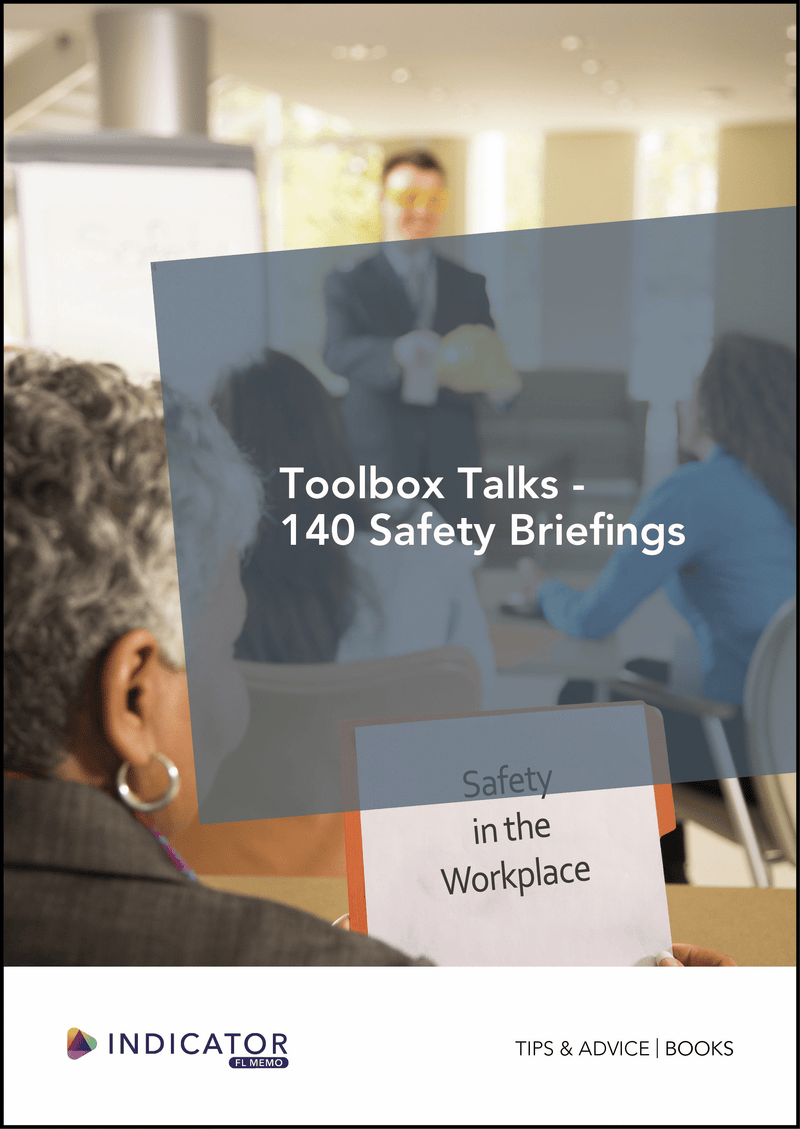 Book titled 'Safety in the Workplace' with a cover showing people in a meeting, likely discussing safety briefings.